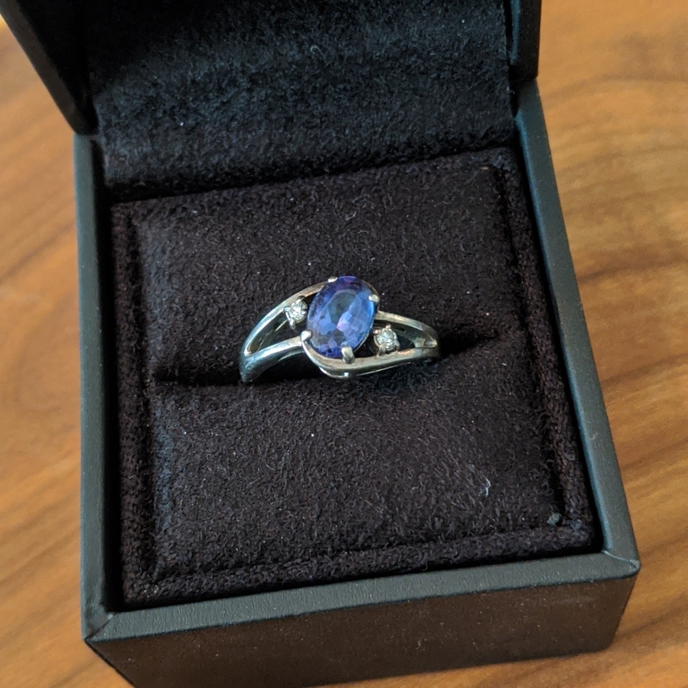 Silver split shank tanzanite and diamond ring